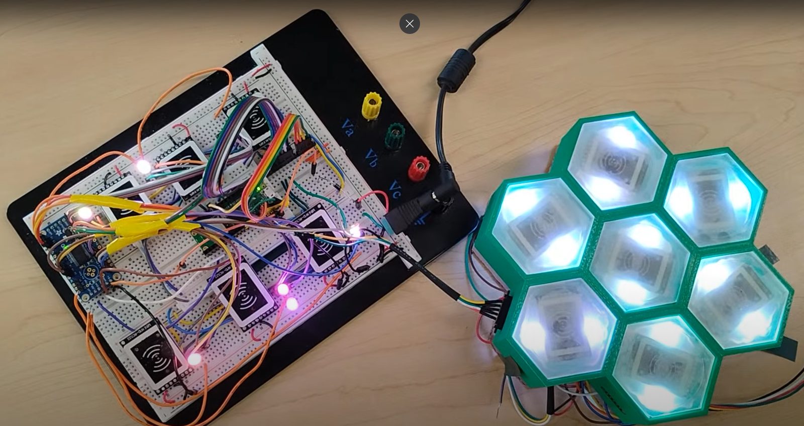 Hexagon-tiled gameboard with NFC readers and RGB LEDs